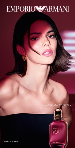 Banner Emporio Armani pentru noul parfum Power of You, cu fundal roșu și sticluță elegantă de parfum prezentată în prim‑plan.